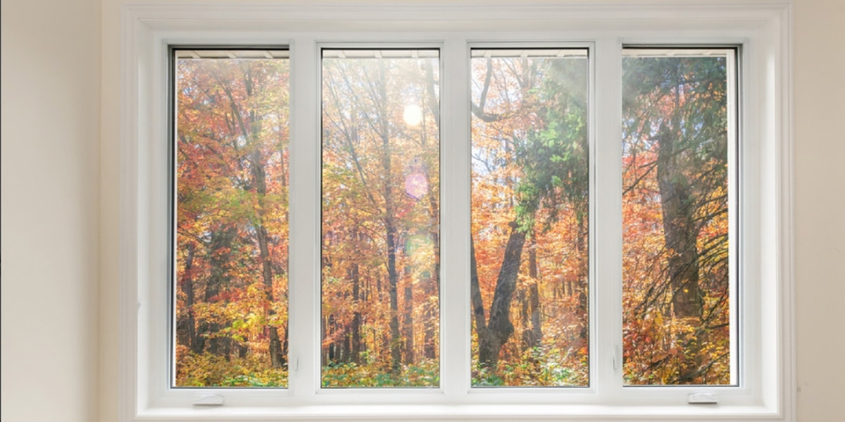 Imagen de ventanas Climalit con paisaje otoñal en en el exterior